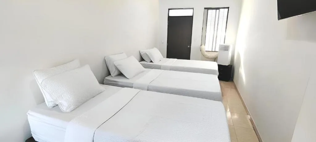 Habitación Triple con balcón del Hotel San Rin